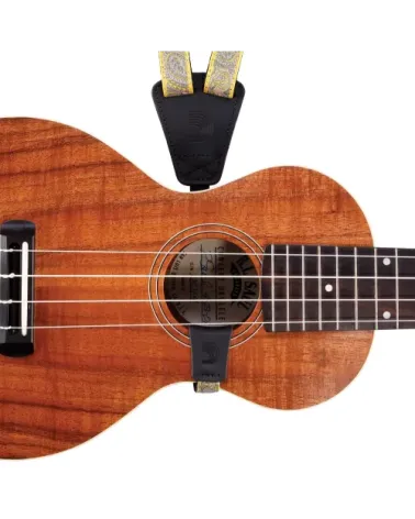 D’Addario. Correas de tipo estribo para ukelele. Paisley amarillo/morado